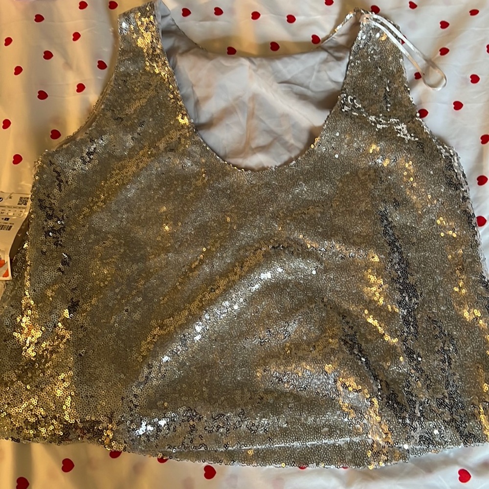 New with tags woman’s glittery tank